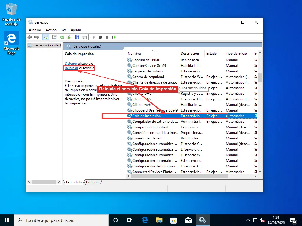 Consola de Servicios de Windows con el servicio Cola de impresión seleccionado y el enlace Reiniciar el servicio resaltado
